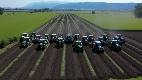 aerial view of tractors in a field