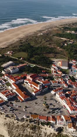 aerial view city of nazare portugal vertical video 05