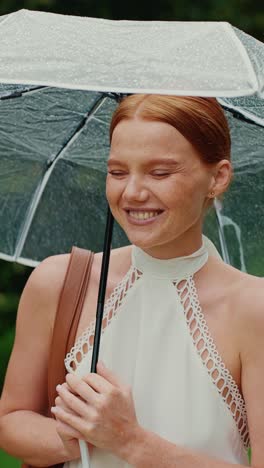 woman under umbrella in the rain