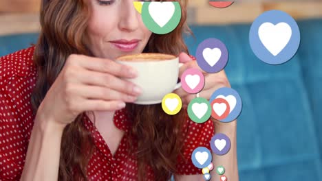 Animación-De-Iconos-De-Corazón-De-Redes-Sociales-Y-Números-Sobre-Una-Mujer-Tomando-Café