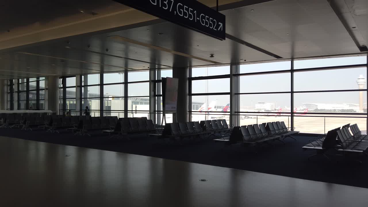 Inside passenger terminal in Shanghai Pudong Airport without passenger walking in terminal