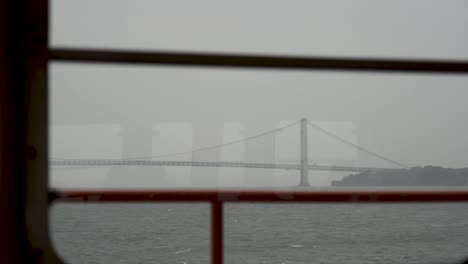 view of brooklyn bridge from staten island ferry, new york city