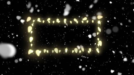 animation of fairy lights frame with copy space over snow falling on black background