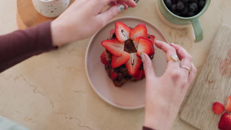 Pancakes,-strawberry-for-decoration-and-hands