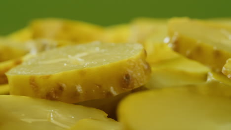 close-up of sliced pickled cucumbers