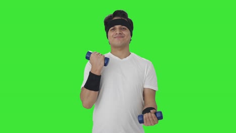 happy indian man lifting dumbbells green screen