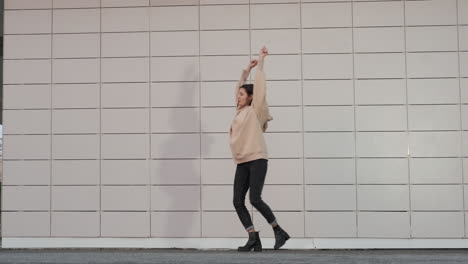 woman dancing outdoors