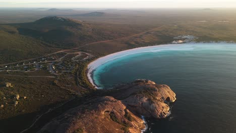 sunrise over lucky bay, esperance australia. drone rotates around the rocks