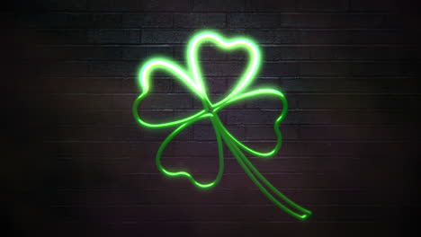 big neon green shamrock on wall