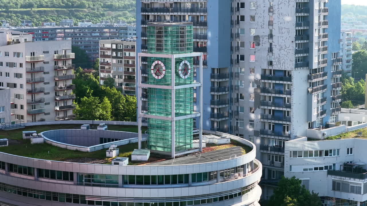Telephoto aerial around the clock tower at the Sun Square of Prague 13, Czech Republic