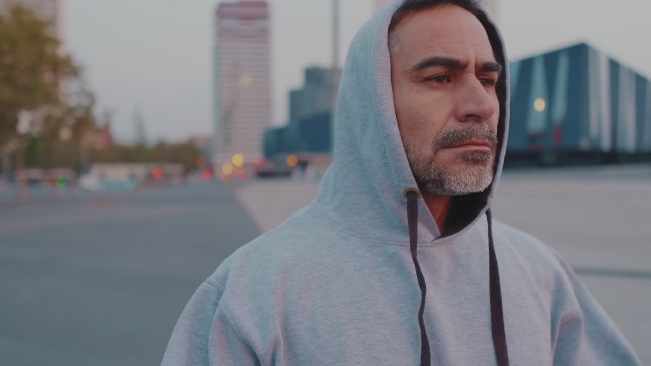 Man in hoodie in the city