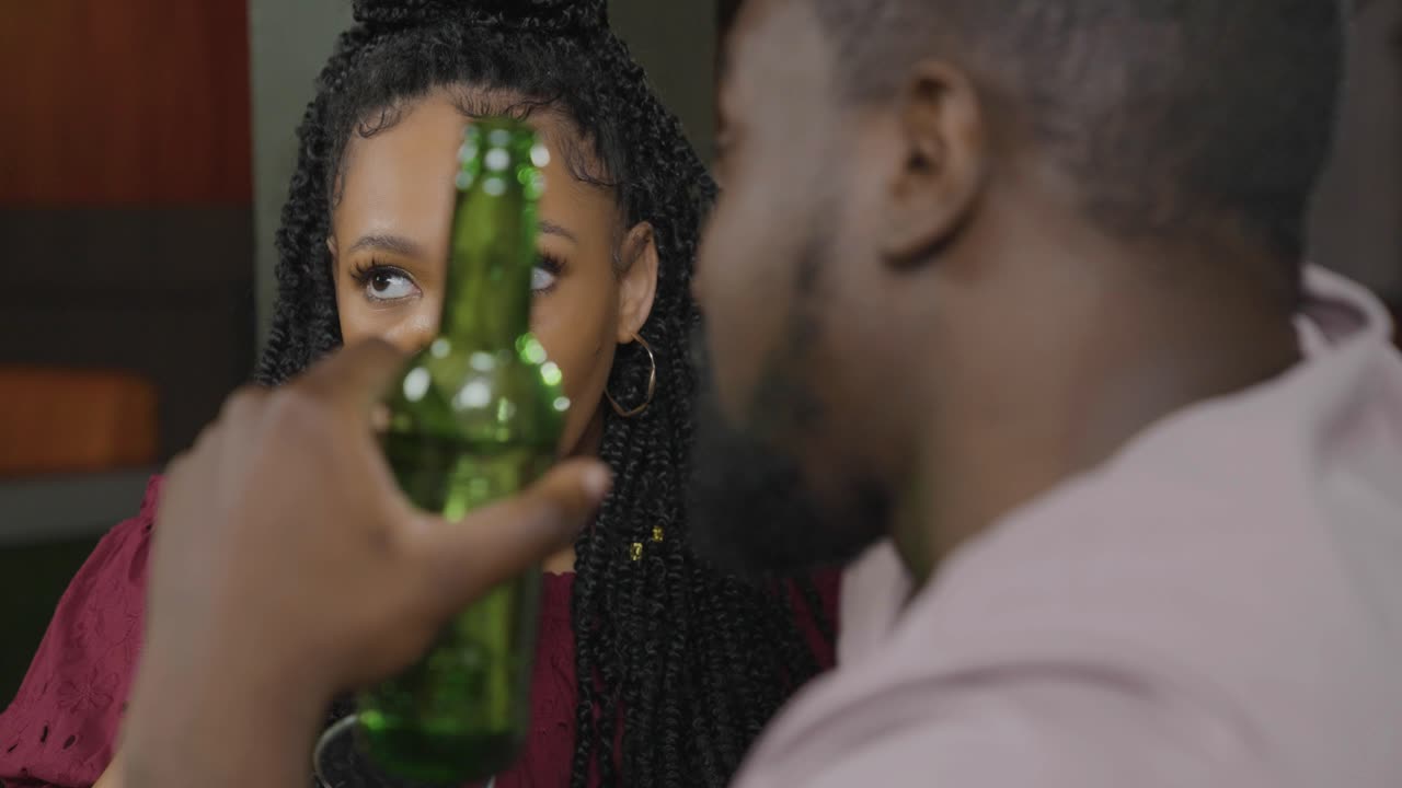 Over the Shoulder Shot of Bored Woman On Disappointing Date