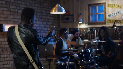 band rehearsing in a recording studio