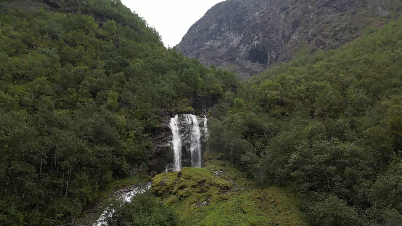 Stunning Waterfall in Lush Green Forest Mountain