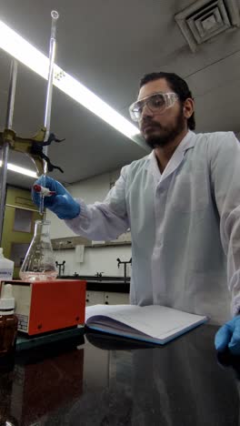 man in lab coat conducting analysis
