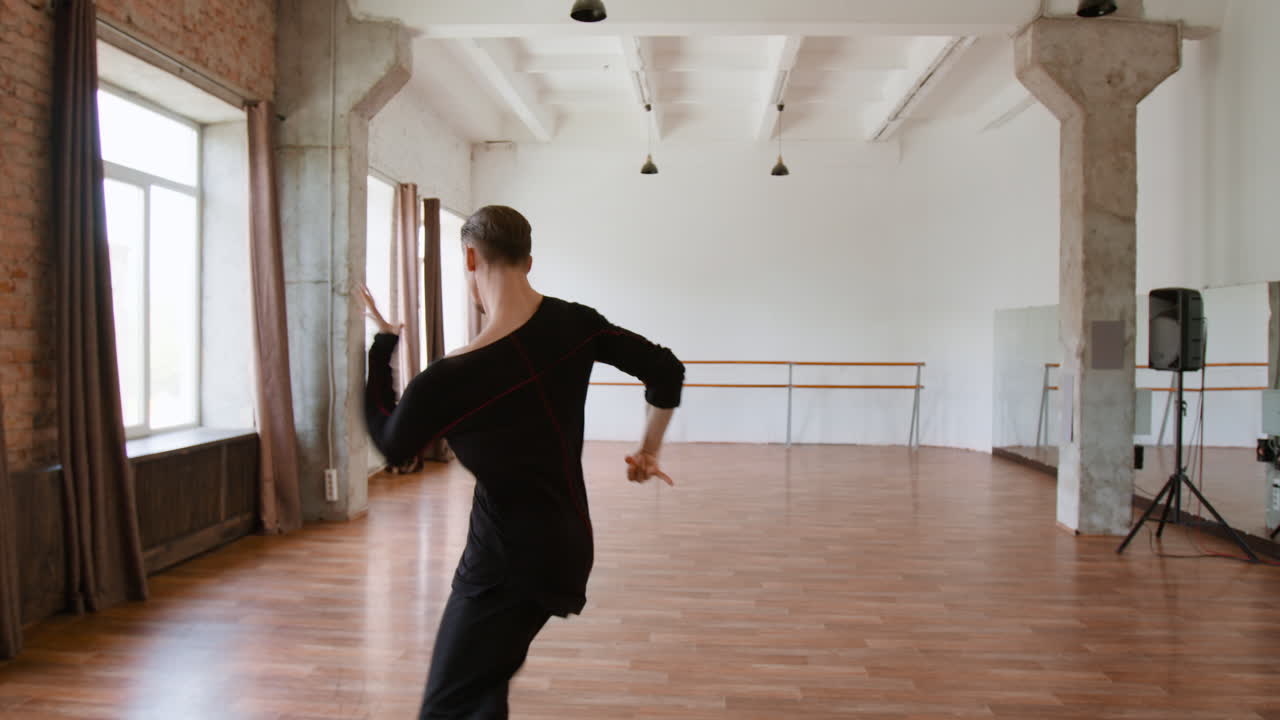 Male Dancer Practicing in a Dance Studio