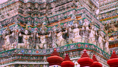 thai traditional literature ancient giant statue around the base and pagoda of wat arun