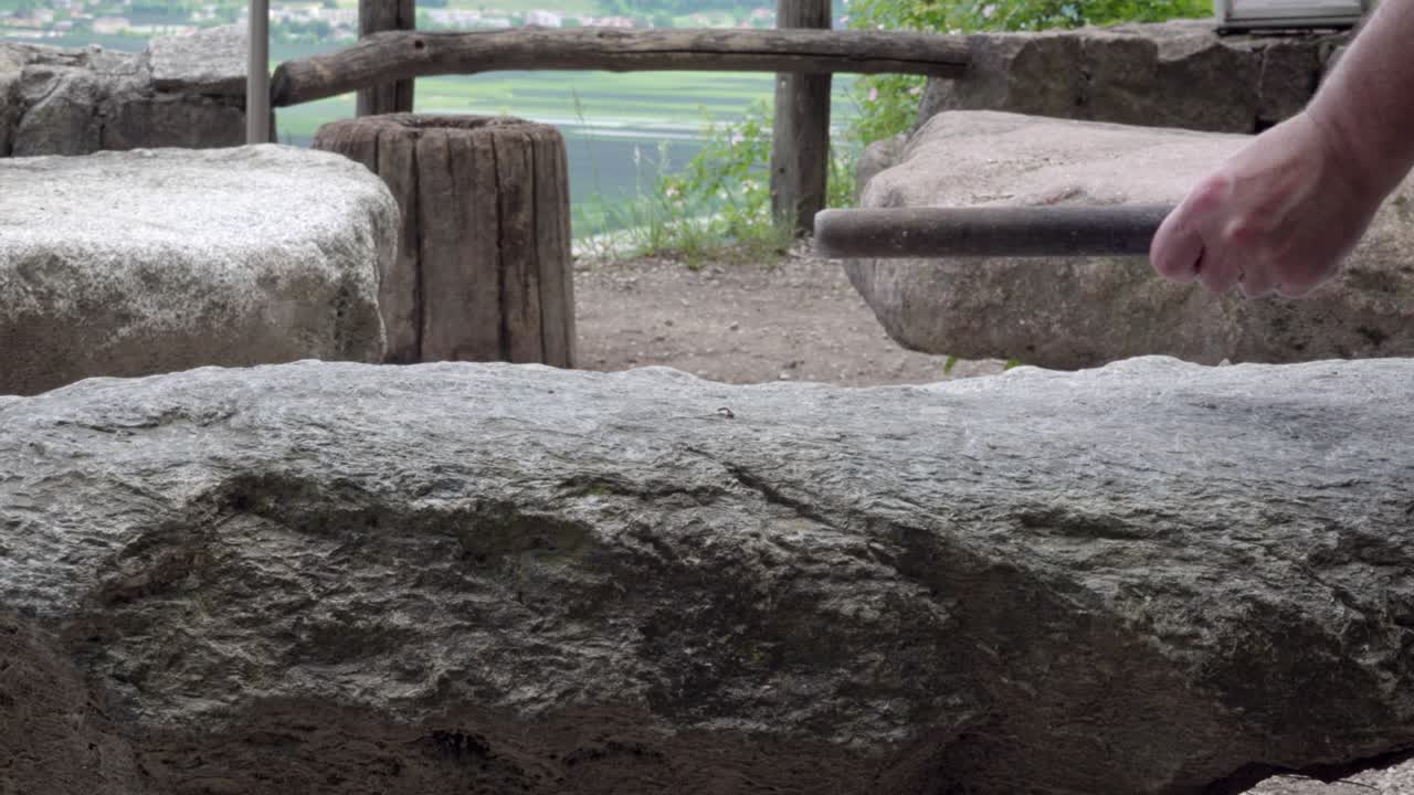 Sound is produced by lightly hitting a stone with a piece of metal