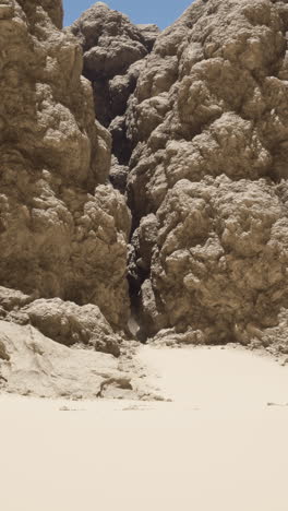 a narrow canyon in the desert