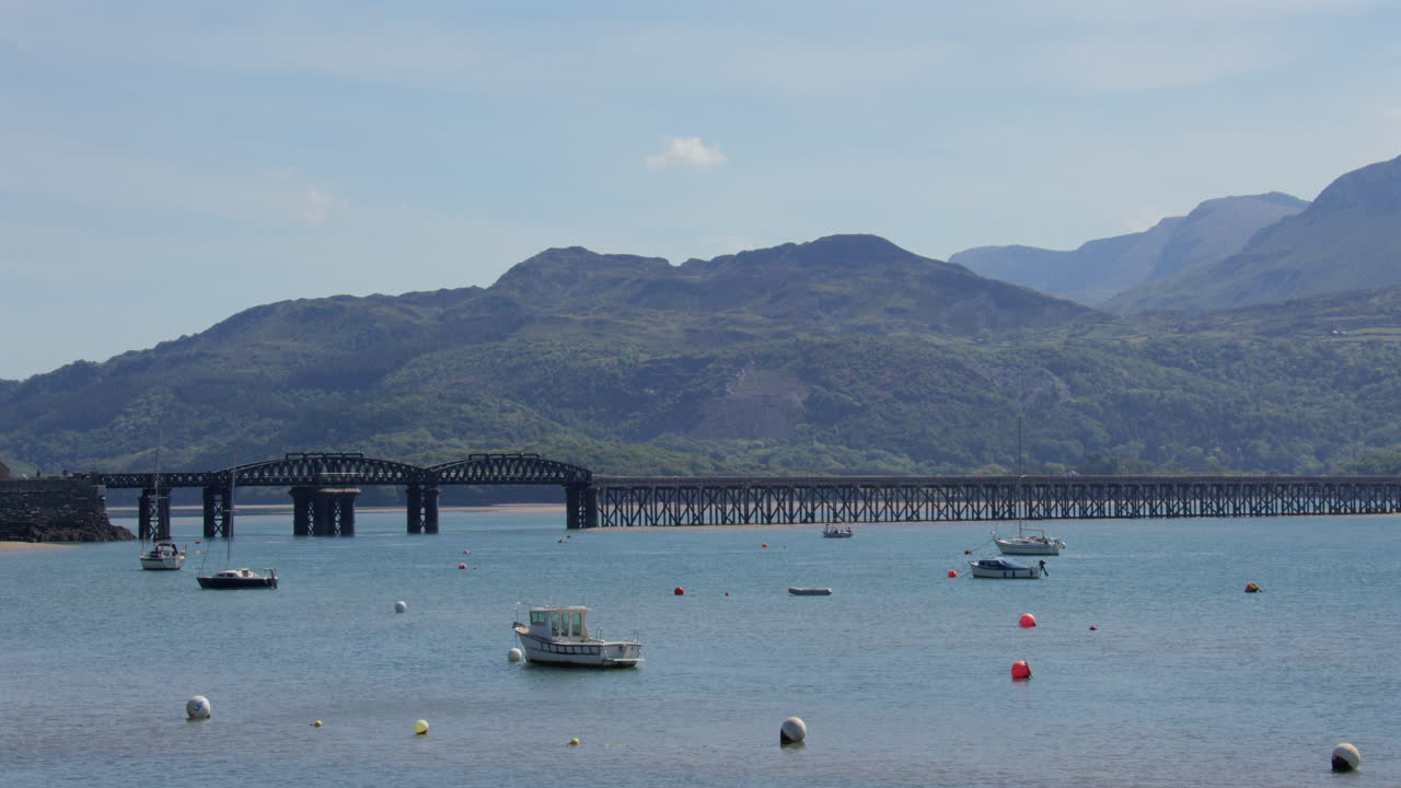 Wide shot of the north end of Barmouth rail bridge,