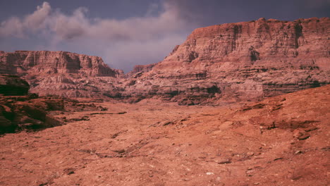 expansive rocky landscape under a dramatic sky in a remote desert region