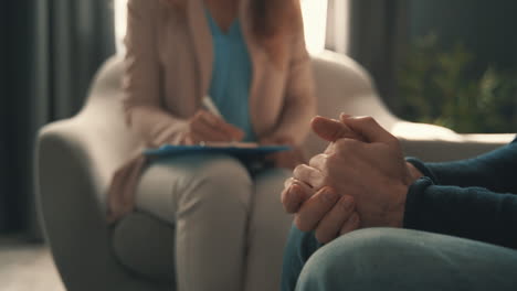 male patient in the consultation of a female psychiatrist