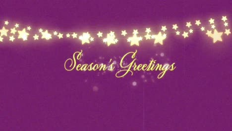 Animation-of-gold-glowing-season's-greetings-text-over-fireworks-and-glowing-fairy-lights-on-purple-