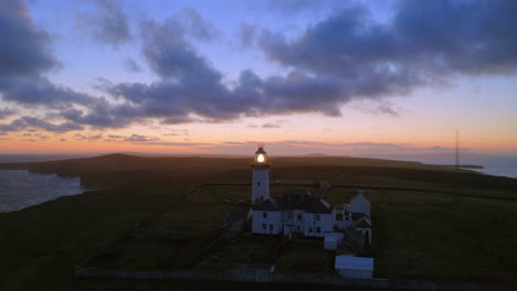 lighthouse beaming in slow motion on a vibrant morning