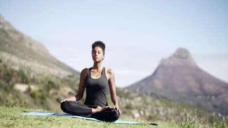woman meditating in nature