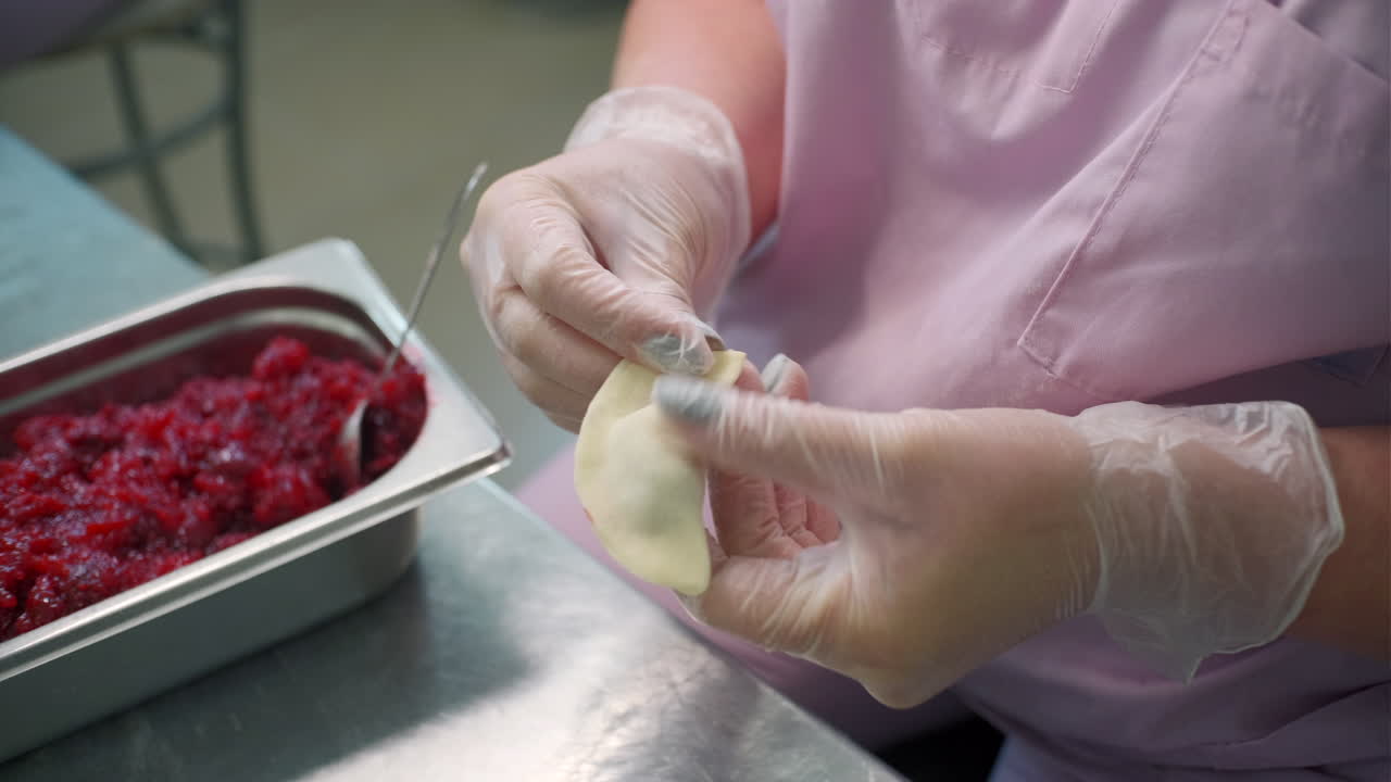 Woman Making Pierogi