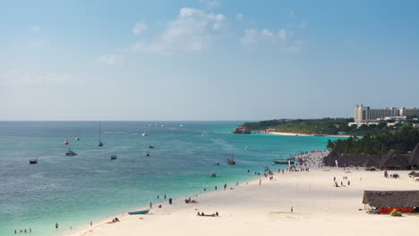 wonderful white sandy beach at zanzibar, sunny day and turquoise ocean, zanzibar, tanzania, time-lapse at 24 fps