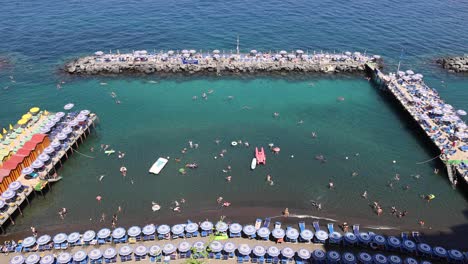 aerial view of tourists swimming and relaxing