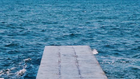 beautiful seascape view. perspective view of stone pier on the sea