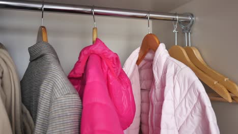 clothes hanging in a closet