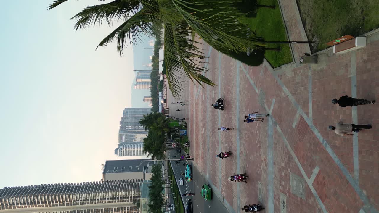 Cityscape with Palm Trees and People Walking