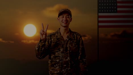 smiling soldier in camouflage uniform with v-sign gesture