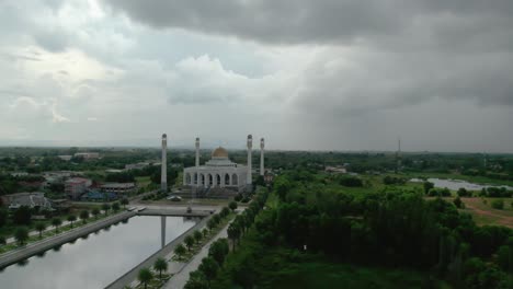 landscape drone camera sunset at mosque of songkhla province,thailand. beautiful grand mosque in ramadan day evening sunset. video nature color 4k resolution.