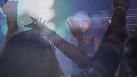 animation on blurred night road traffic over caucasian male singer and people hands on concert