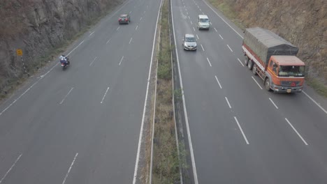 multi-lane mumbai bangalore highway traffic near pune, road travel in india