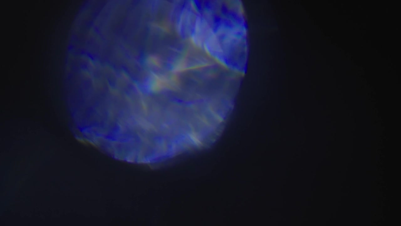 Abstract Colorful Lens Flare Light Leak on Black Background