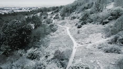 Aerial-view-of-stunning-wintery-and-snowy-scene-on-Cavehill,-Belfast