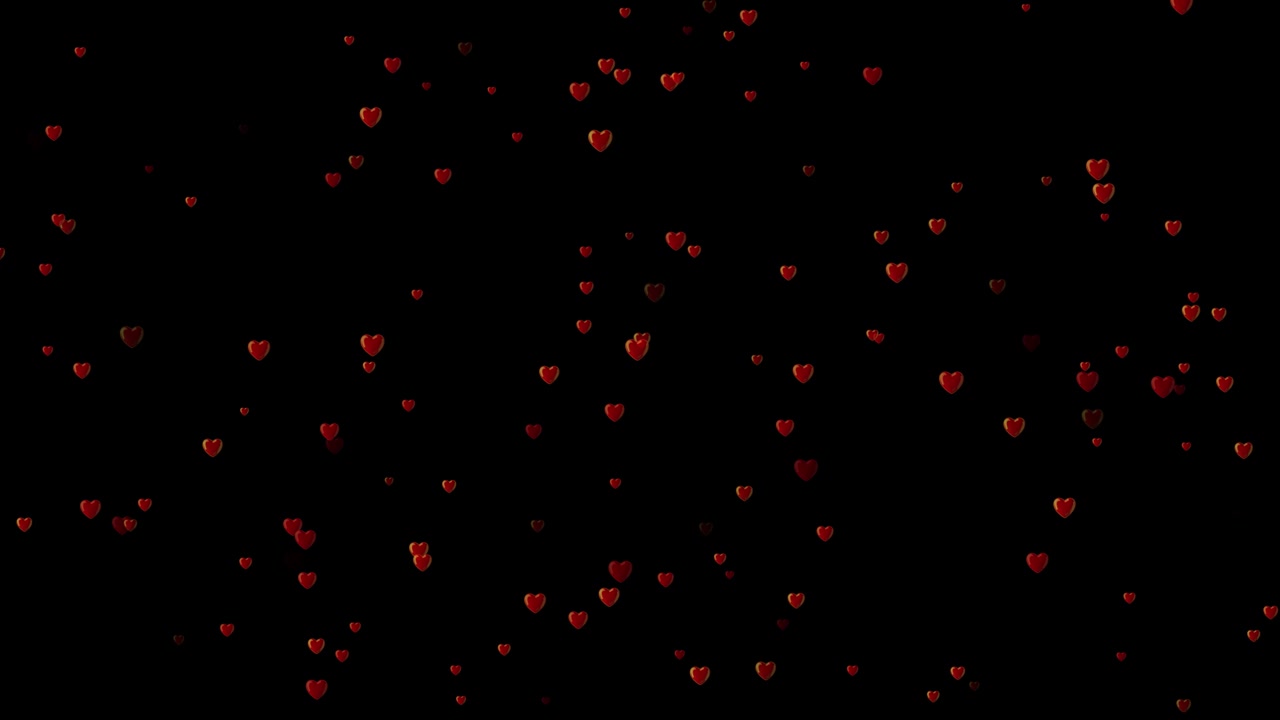 Sfondo video con particelle a forma di cuore che esplodono con fuoco d'amore