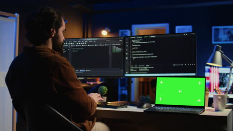 mockup laptop on desk where software engineer writes lines of code