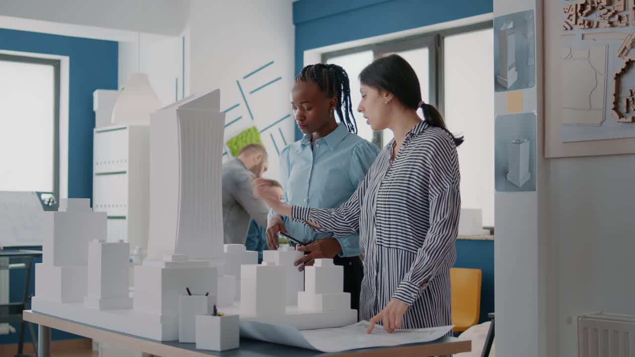 Architects Collaborating on City Model Design