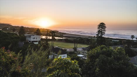 Timelapse-of-sunrise-on-the-beach-of-Wilderness,-Garden-route