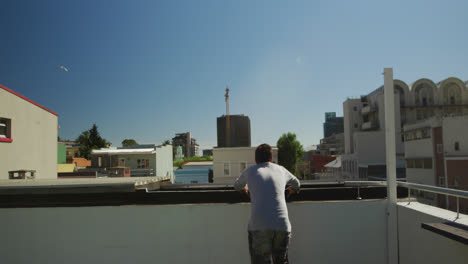 caucasian man practicing parkour