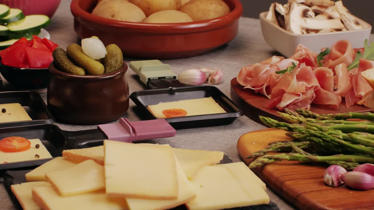 Italian or Spanish restaurant with traditional tapas food, Spanish cuisine, delicious tapas and cheese plate, bruschetta with cheese, olives dry tomatoes and tasty sandwich bar appetizer, buffet