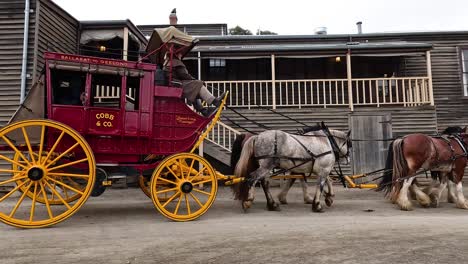 horse-drawn carriage moving through historic town