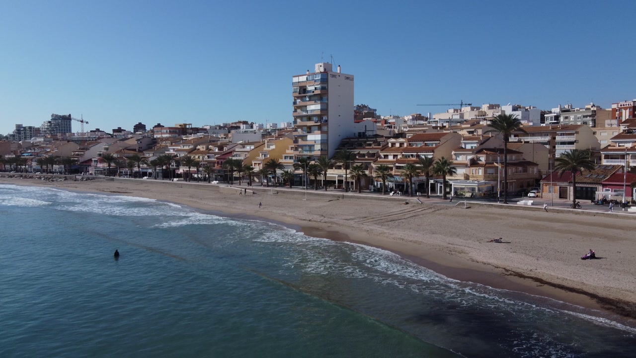 The beach of El Campello on a sunny autumn day, Spain.