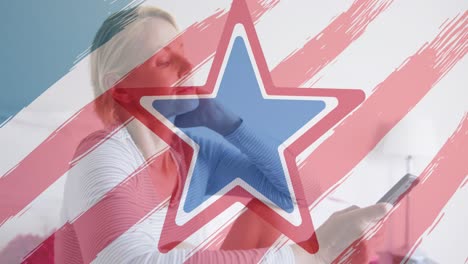 american flag design pattern and pulsating star over caucasian mother using smartphone on bed